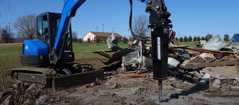 Excavator breaker action shot